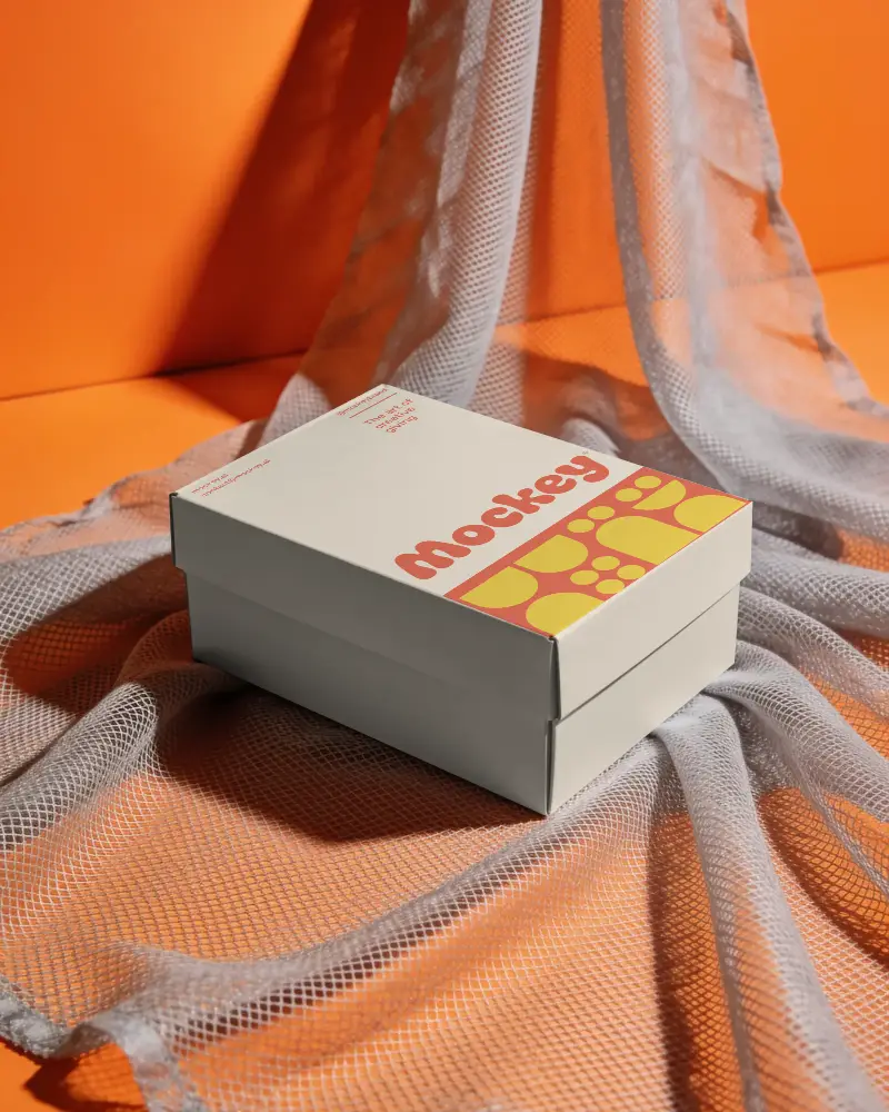 Premium Closed Lid Box Mockup On Mesh Textile For Brand Packaging Presentation