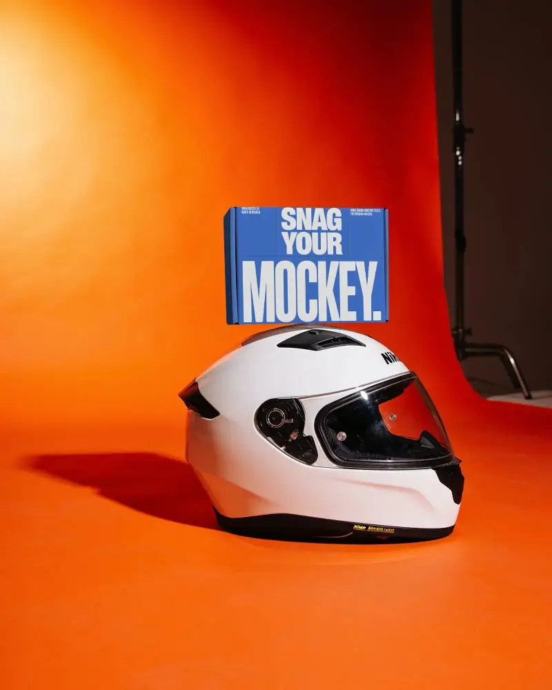 Premium Product Packaging Box Mockup On Creative Helmet Display For Brand Presentation