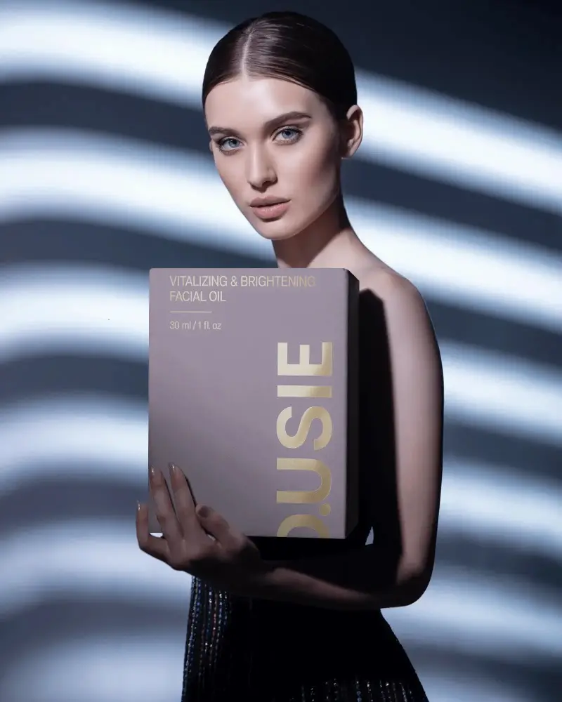 Elegant Minimalist Box Mockup Held By Model For Luxury Brand Packaging Design Showcase