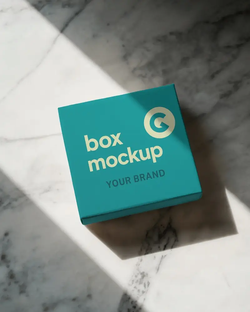 Square Rigid Box Mockup On Marble Surface Harsh Diagonal Lighting Luxury Unboxing Mood