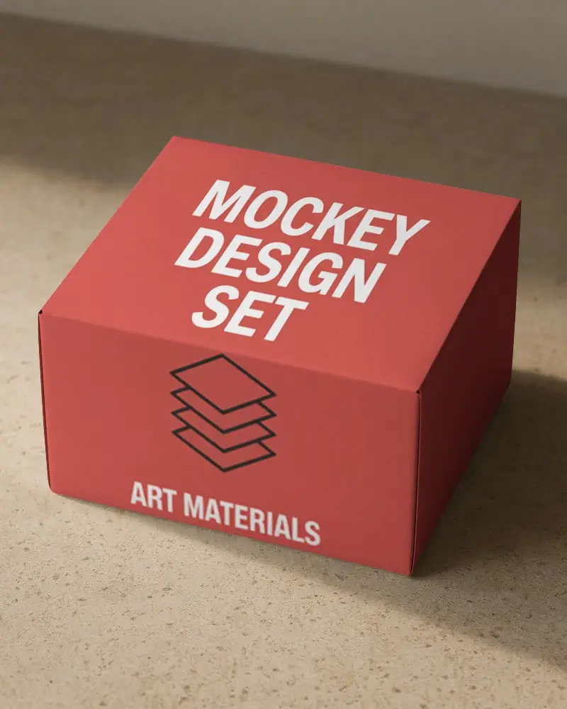 minimal-cuboid-box-mockup-on-beige-stone-surface-soft-shadow-clean-packaging-scene