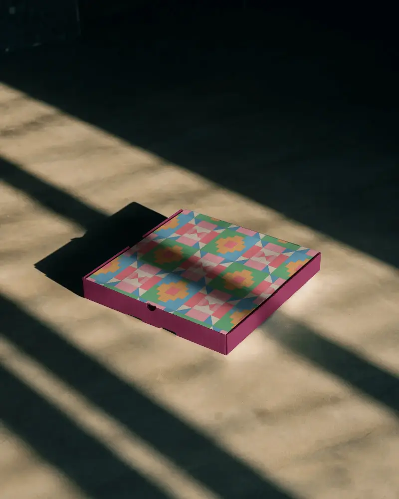 shadow-lit-flat-pizza-box-mockup-on-minimal-floor-with-dramatic-light-and-clean-modern-style