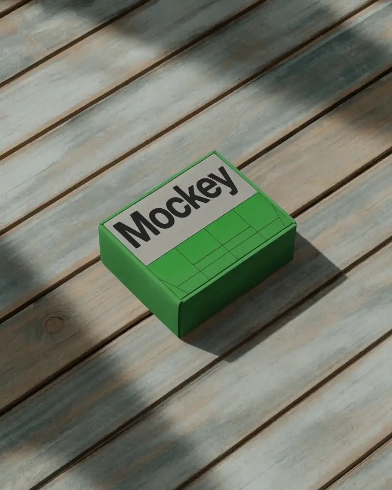 mailer-box-mockup-on-weathered-wooden-deck-with-natural-lighting-and-shadows