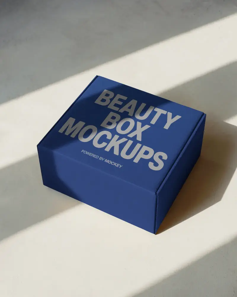 square-cardboard-box-mockup-on-beige-surface-with-soft-shadows-for-minimalist-style