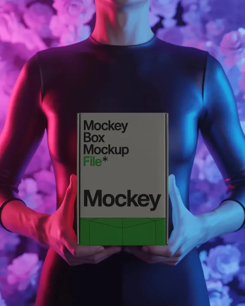 Sleek Box Mockup Held By Person With Vibrant Backdrop Showcased In Modern Setting