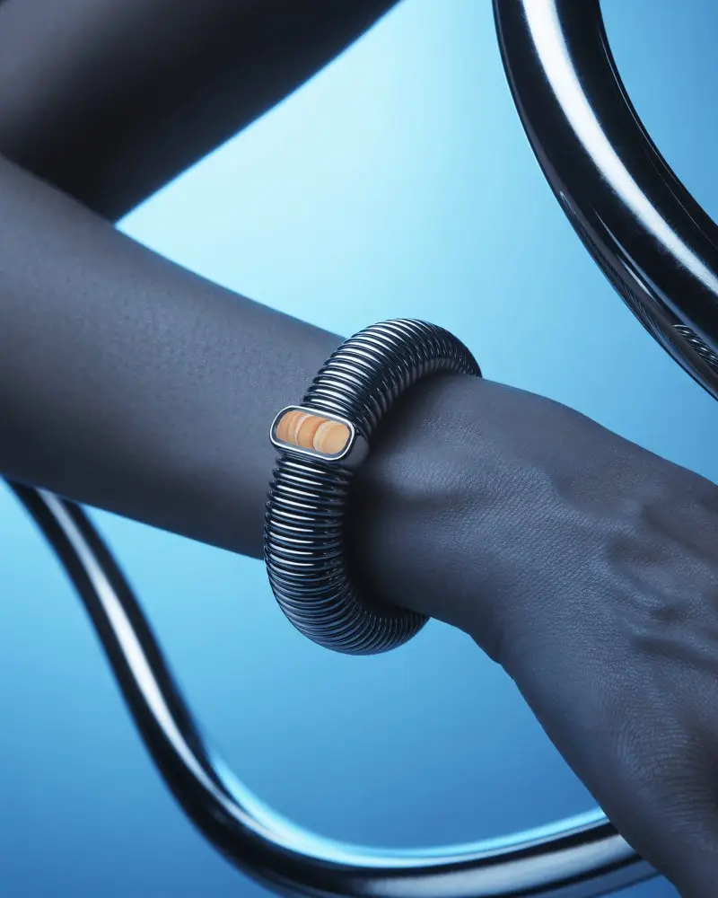 Futuristic Metal Bracelet Mockup On Wrist With Cool Blue Light And Chrome Elements