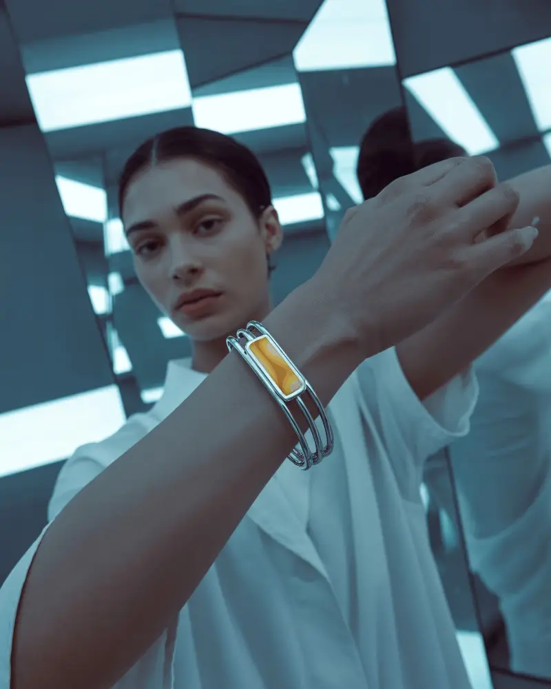 Futuristic Silver Bracelet Mockup On Model In Mirrored Room With Cool Blue Light