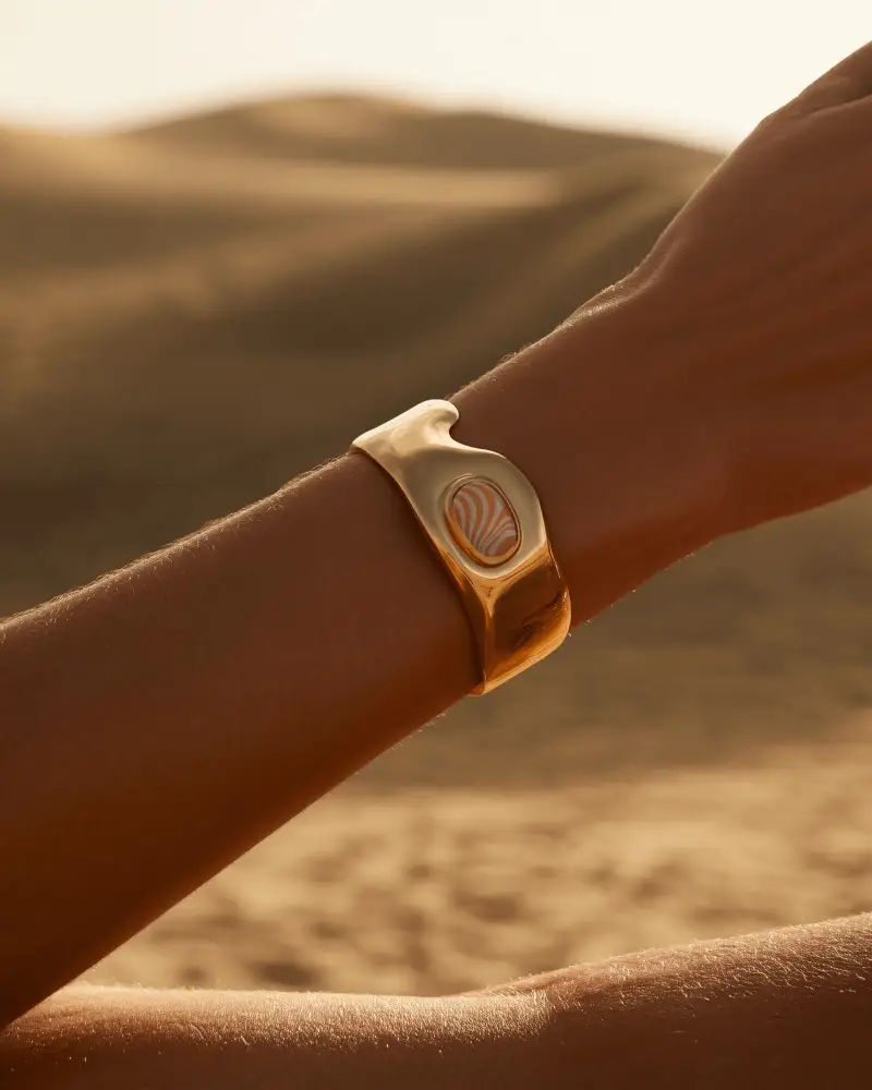 Sunlit Gold Cuff Bracelet Mockup On Wrist In Warm Desert Landscape