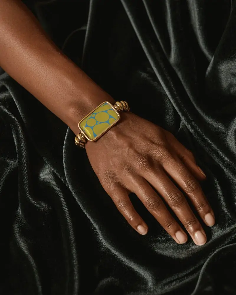 Elegant Gold Bracelet Mockup With Rectangular Face On Rich Velvet Backdrop
