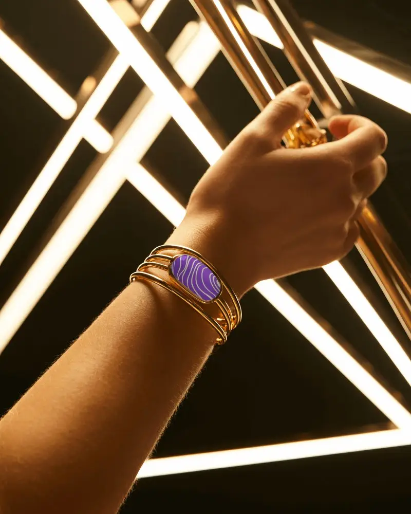 Radiant Gold Bracelet Mockup Against Geometric Light Beams In Modern Studio