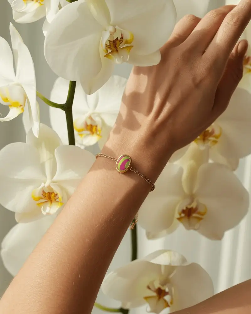 Delicate Gold Bracelet Mockup Among Blooming White Orchids In Soft Natural Light
