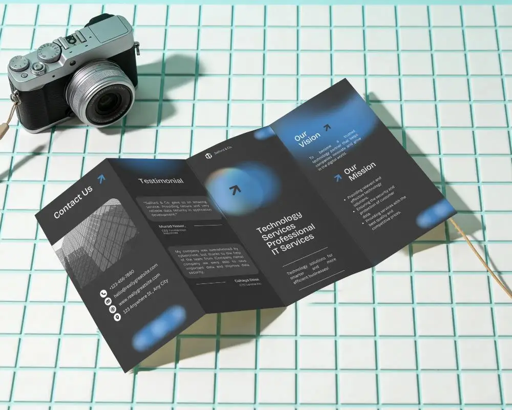Clean Four Fold Brochure Mockup Display On Matted Surface With Vintage Camera Nearby