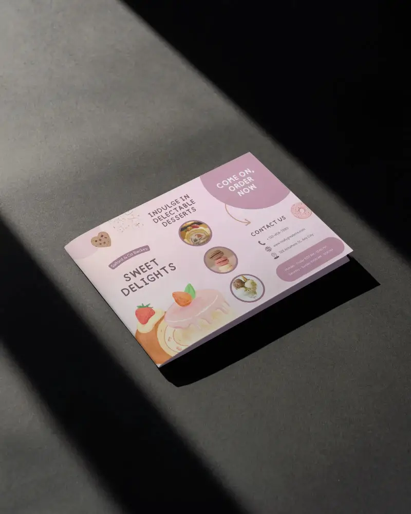 elegant-brochure-mockup-on-dark-grey-background-highlighted-by-angled-light