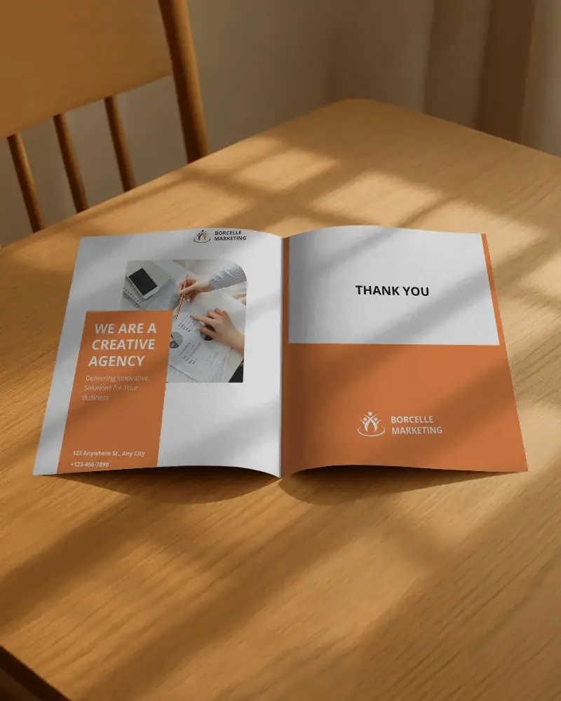 Bifold Brochure Mockup On Wooden Table With Soft Shadows Cozy Home Lighting Vibe