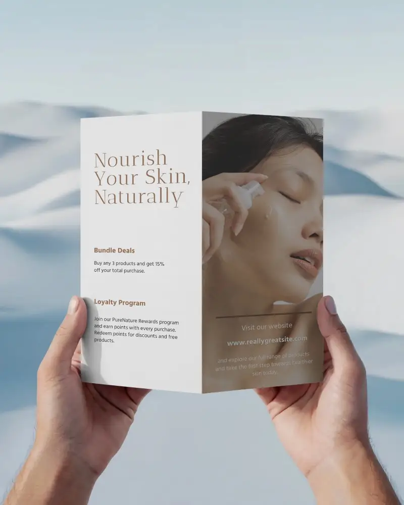 realistic-handheld-brochure-mockup-showcasing-bifold-paper-design-presentation-0465