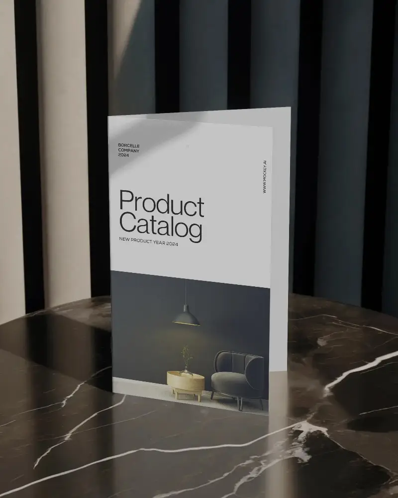 minimalist-folded-brochure-mockup-centered-on-reflective-marble-table-with-dark-curtain