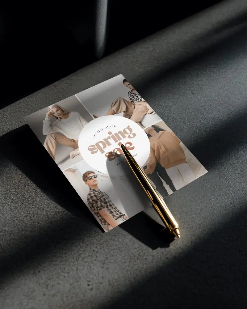 Shadow Rich Square Brochure Mockup With Gold Pen On Dark Surface In Moody Light