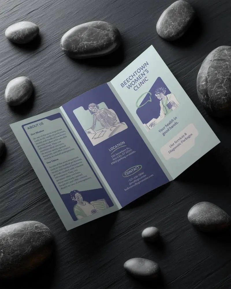 Three Panel Brochure Mockup On Wooden Texture With Smooth Stones Around Blank Design