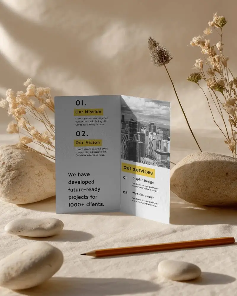 Brochure Mockup Bifold Brochure Standing On Natural Fabric With Dried Flowers And Soft Sunlight