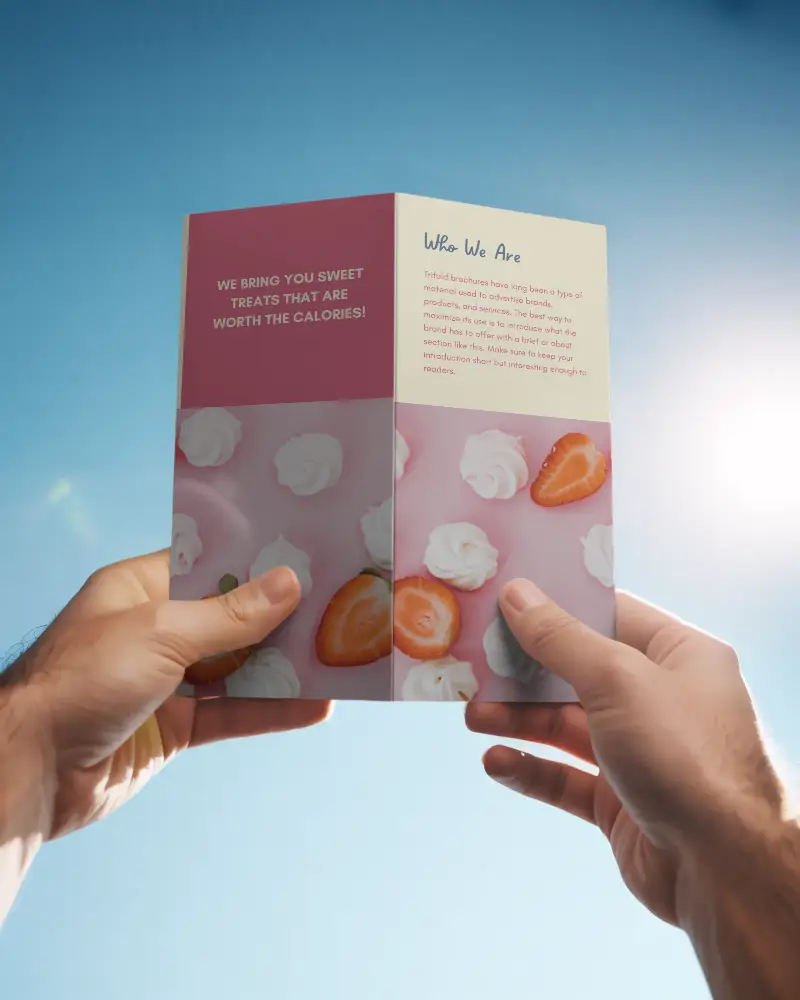 Hands Holding Folded Brochure Mockup Against Clear Sky Background For Design