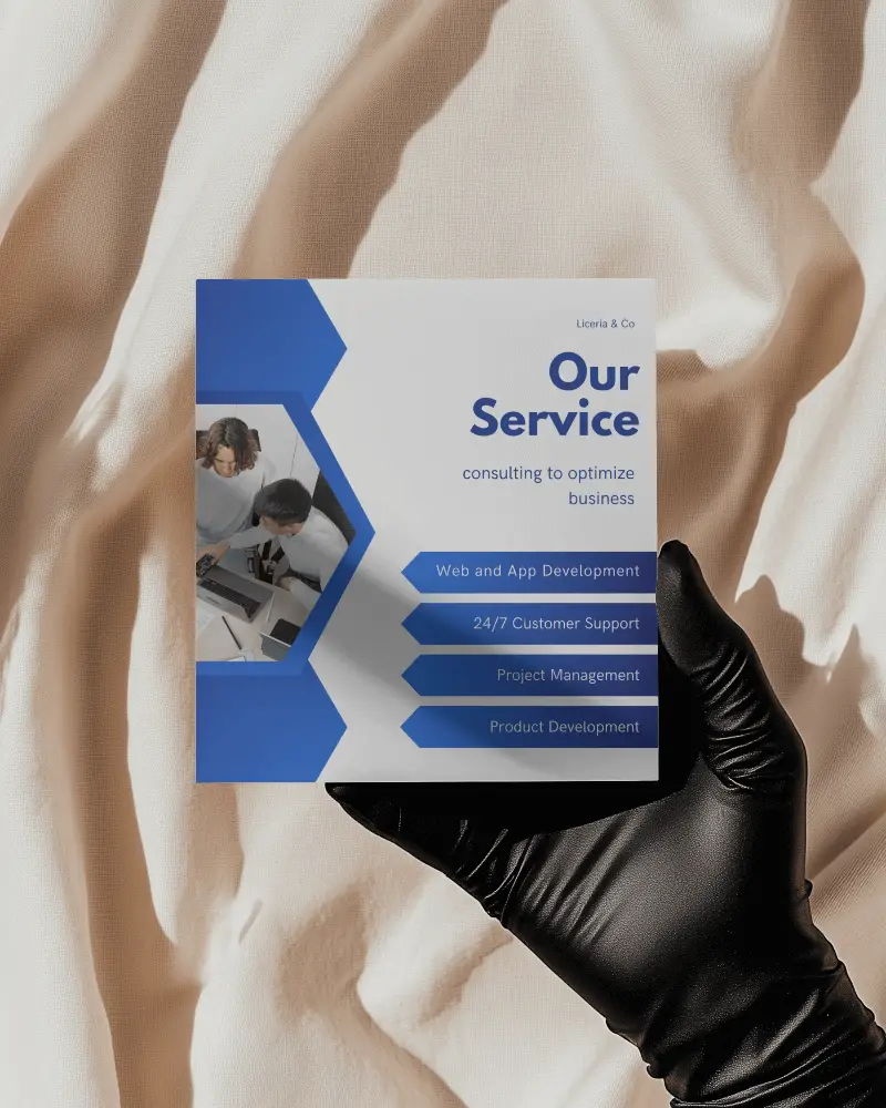 Hand Holding Square Brochure Mockup Black Glove On Cream Fabric Minimalistic Elegant Brand Presentation Soft Lighting Shadow Play Premium Marketing Template