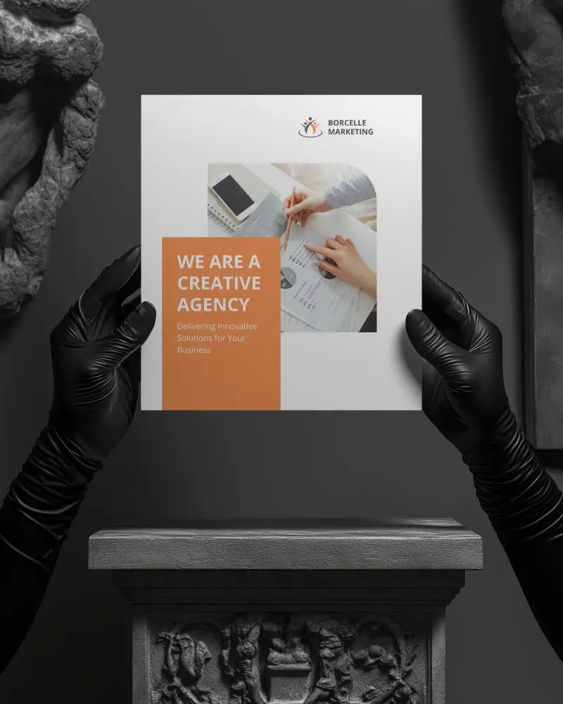Square Hand Holding Brochure Mockup Black Gloves In Classical Museum Setting Minimal Creative Agency Presentation Clean White Background