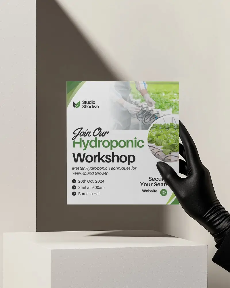 Square Hand Holding Brochure Mockup Black Glove Against Minimal White Surface With Soft Shadows Clean Stationary Display Elevated Lighting Studio Scene