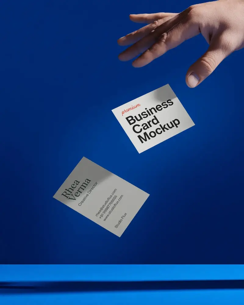 Floating Business Card Mockups In Hand Over Solid Color Background Creative Presentation