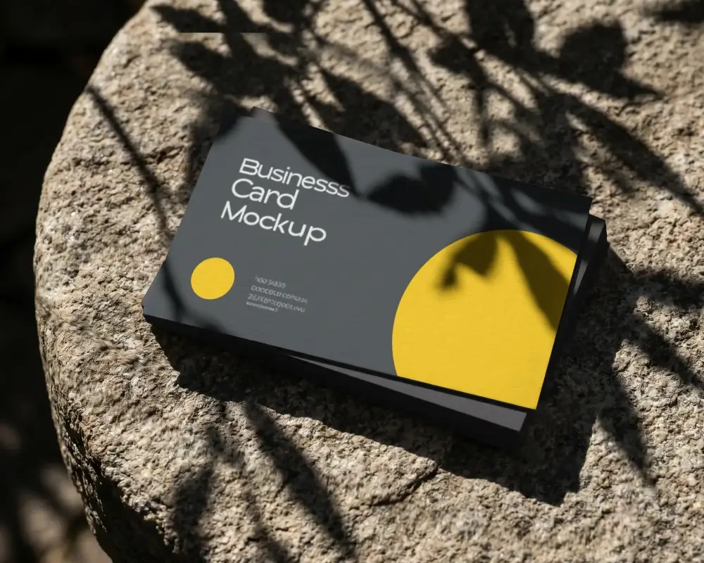 Stack Of Plain Business Cards Mockup Casting Shadow On Granite Textured Tabletop Surface