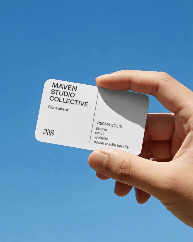 Closeup Hand Holding Premium Business Card Mockup With Rounded Corners On Blue Sky Backdrop