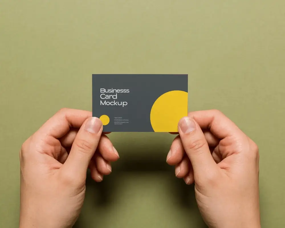 Professional Hand Holding Business Card Mockup For Branding And Marketing Purposes