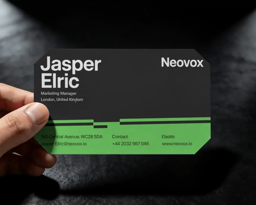 Person Presenting Plain Business Card Mockup With Chamfered Edges On Contrasting Dark Backdrop