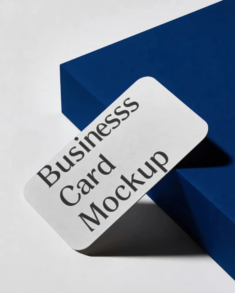 Sleek Rounded Edge Business Card Mockup On Geometric Surface With Dramatic Shadow Play