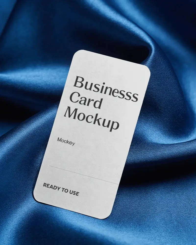 Premium Blank Durable Business Card Mockup With Rounded Corners On Smooth Silk Fabric Background