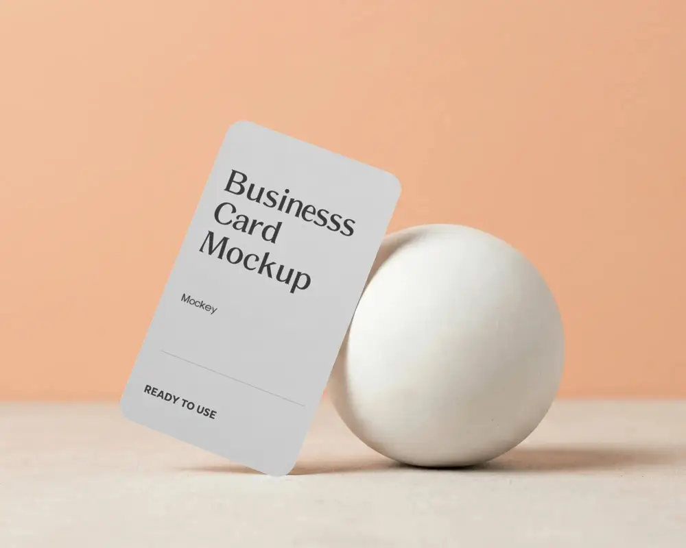 Floating Business Card Mockup With Rounded Corners Next To Rigid Spherical Object