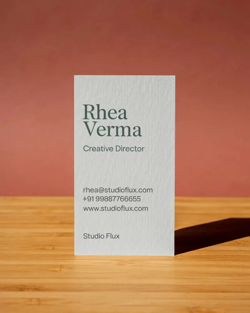 Premium Textured Business Card Mockup Standing On Wooden Surface With Shadow Effect