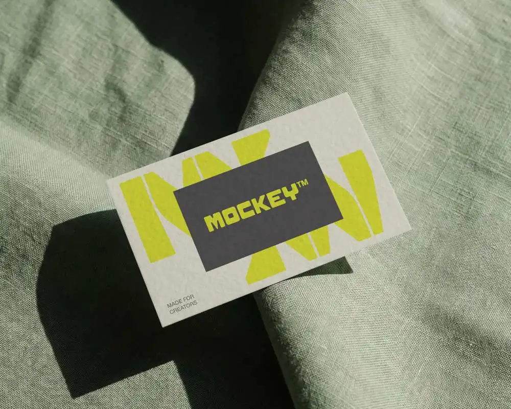 Textured Thick Paper Business Card Mockup On Soft Fabric Background For Branding Showcase