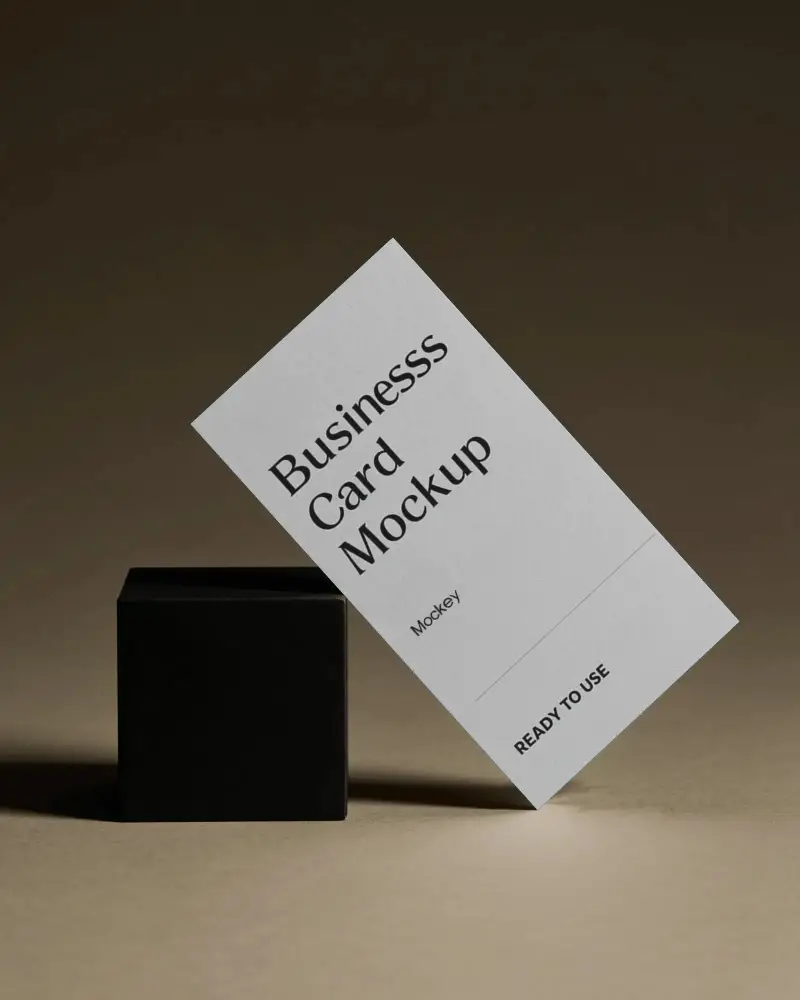 Minimalist Business Card Mockup Floating Above Solid Block On Neutral Surface Background