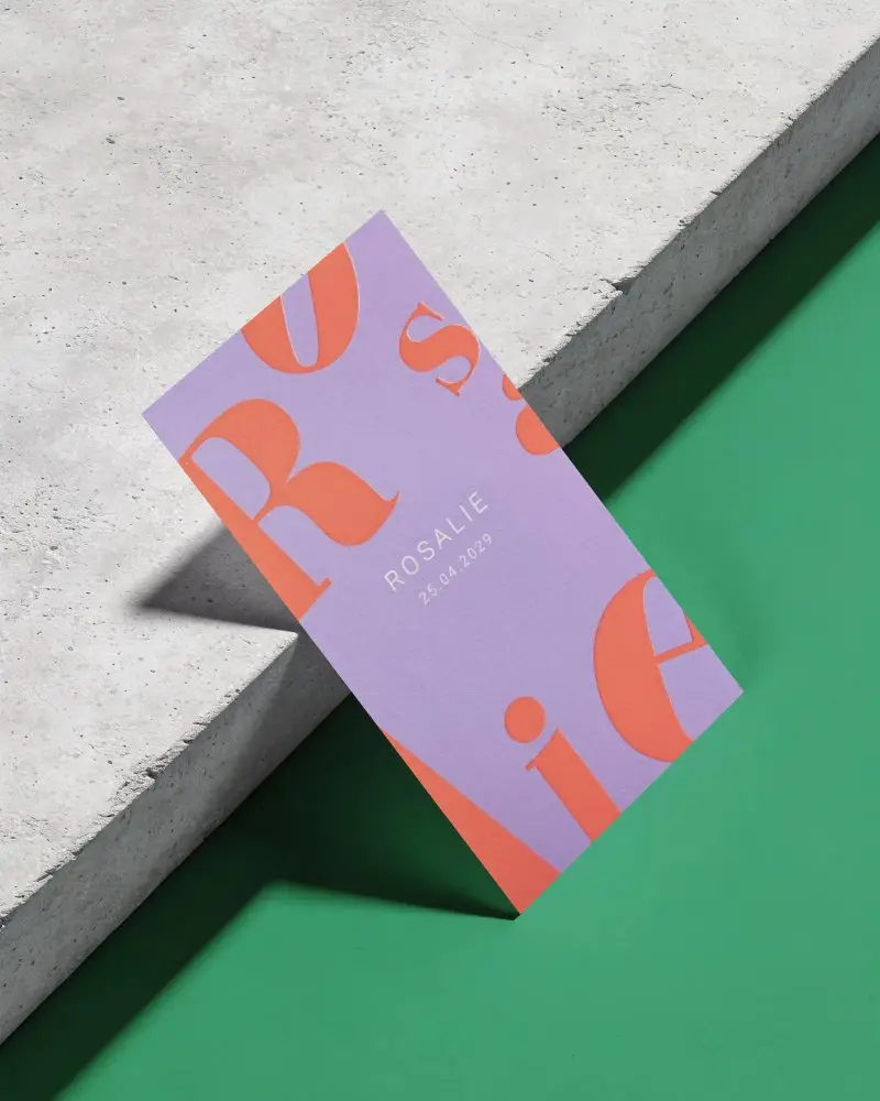 Clean Business Card Design Mockup Angled Over Rough Concrete Platform And Plain Backdrop