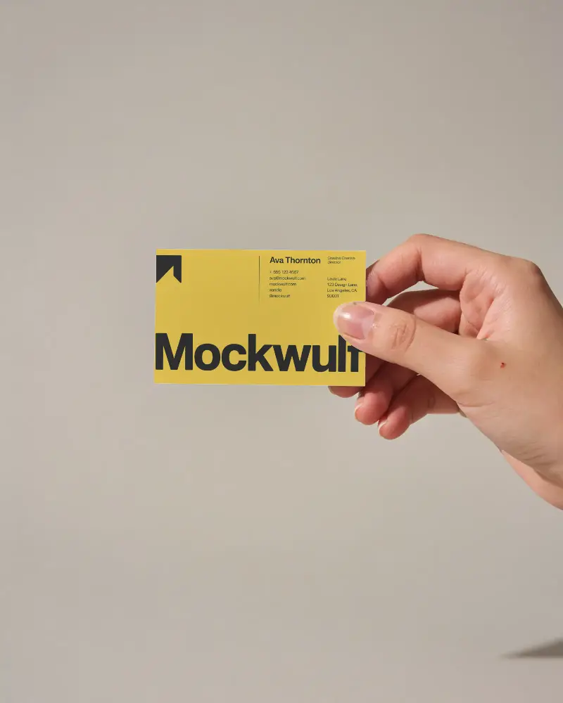Clean Simple Business Card Mockup Held By Human Hand For Easy Editing And Personalization