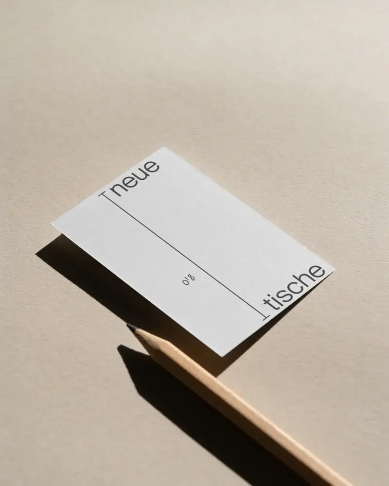 Blank Clean Business Card Mockup Showcasing Simple Design And Pencil Shadow Play