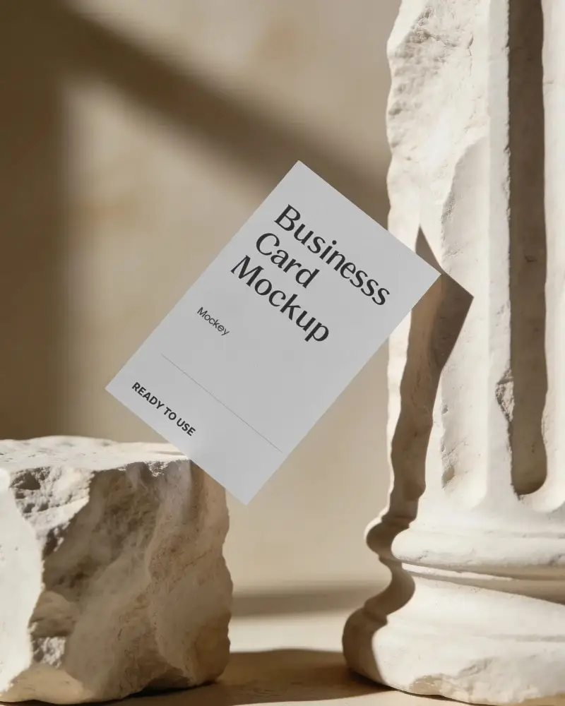 Minimalistic Floating Business Card Mockup With Textured Stone And Classic Column Background