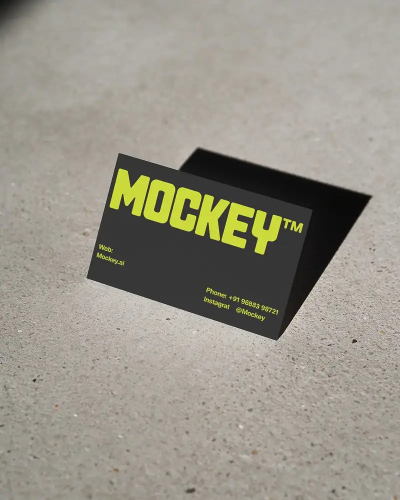 Minimalistic Business Card Mockup On Raw Concrete With Sharp Shadow And Light