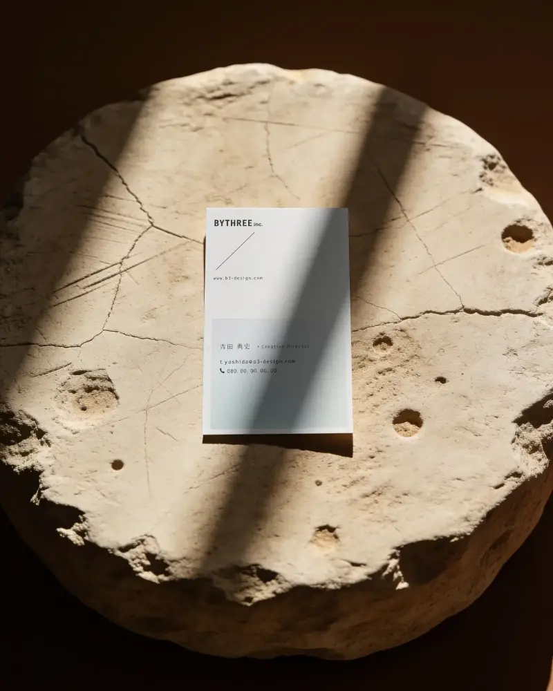Minimalistic Modern Business Card Mockup On Textured Stone Surface With Shadow Play