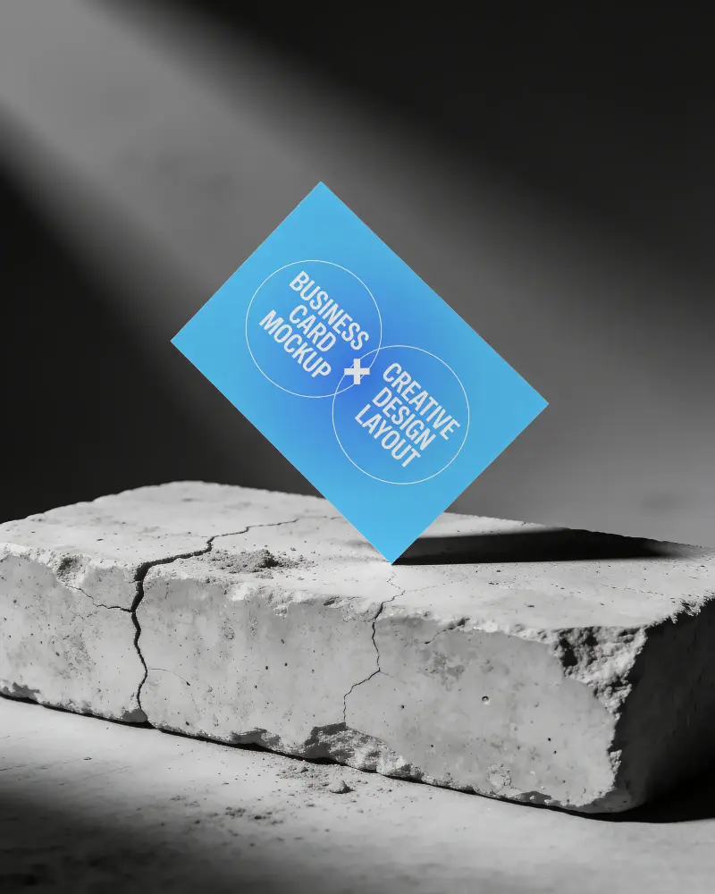 Creative Business Card Mockup Hovering Over Textured Concrete Block With Shadow Play