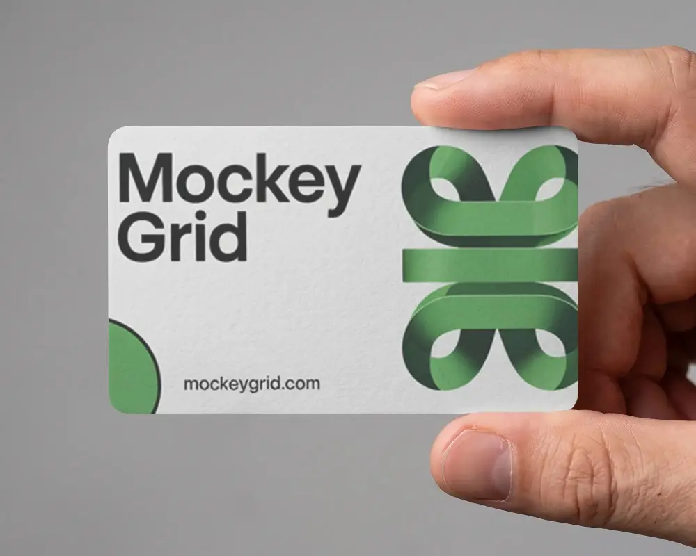 Empty Rounded Business Card Mockup Held Between Fingers For Professional Identity Showcase