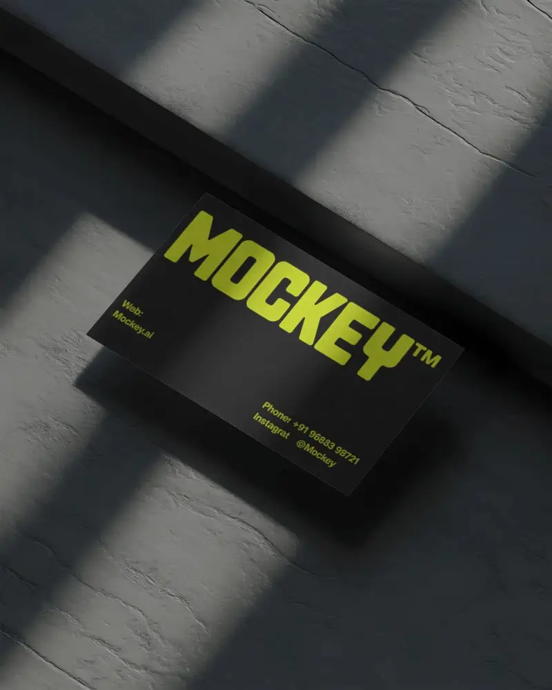 realistic-business-card-mockup-on-concrete-background-ideal-for-professional-branding-presentations