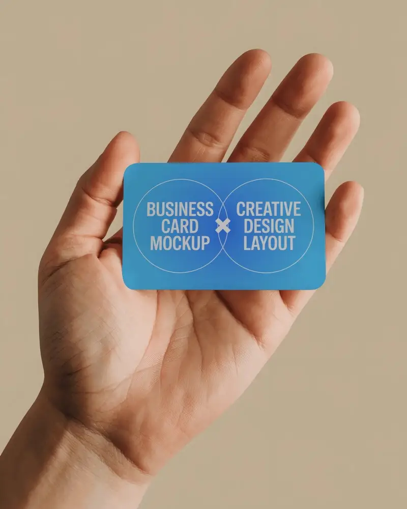 realistic-hand-holding-blank-business-card-mockup-for-creative-marketing-showcase-design