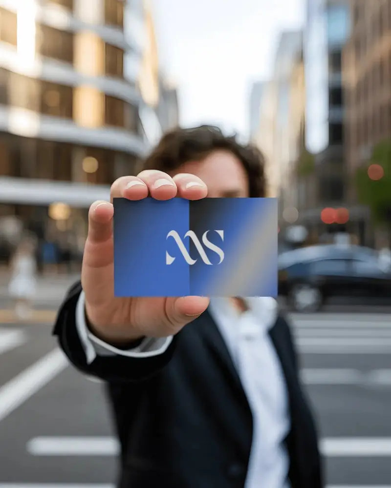 professional-business-card-mockup-in-hand-urban-background-for-branding