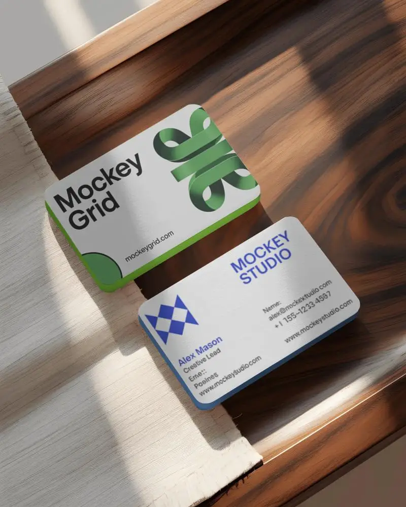 premium-quality-business-card-mockups-on-wooden-surface-for-design-presentation